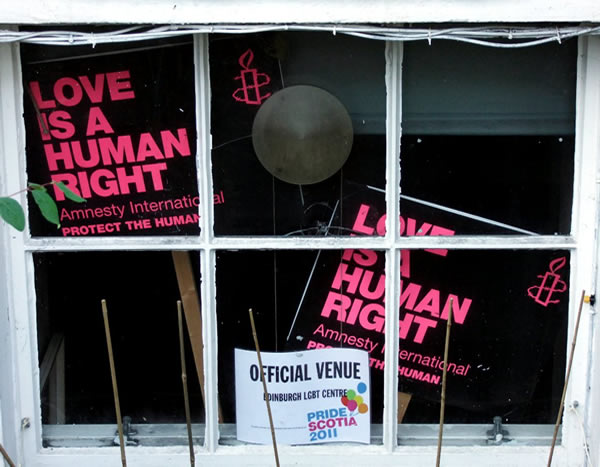 Placards on human rights in a basement window