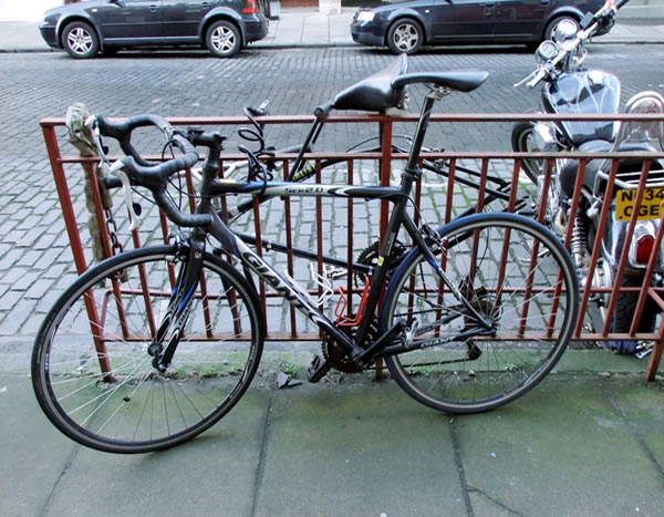 Bikes chained to railings on Broughton Street