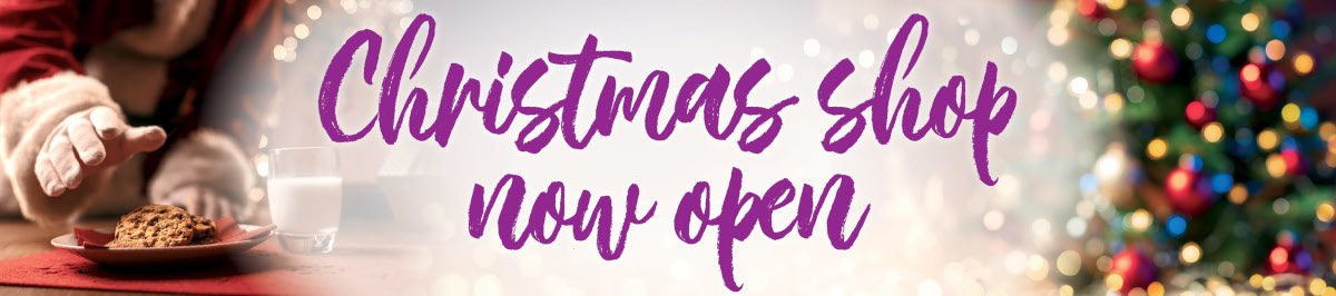 A banner saying Christmas Shop Open