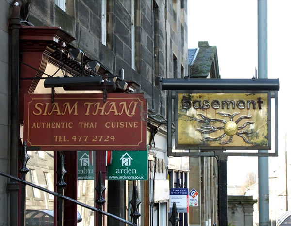 Various restaurant signs on Broughton St