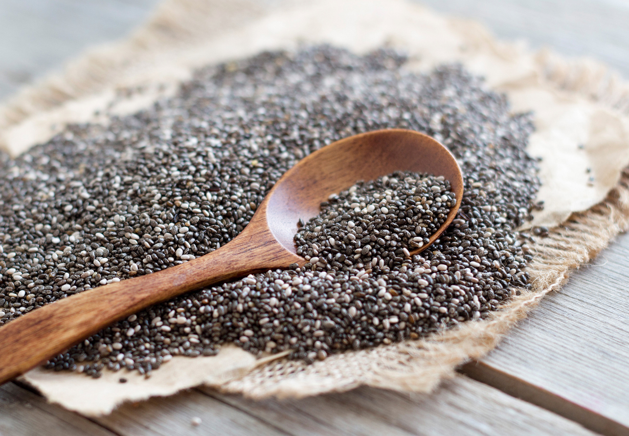 Chia seeds in a wooden scoop